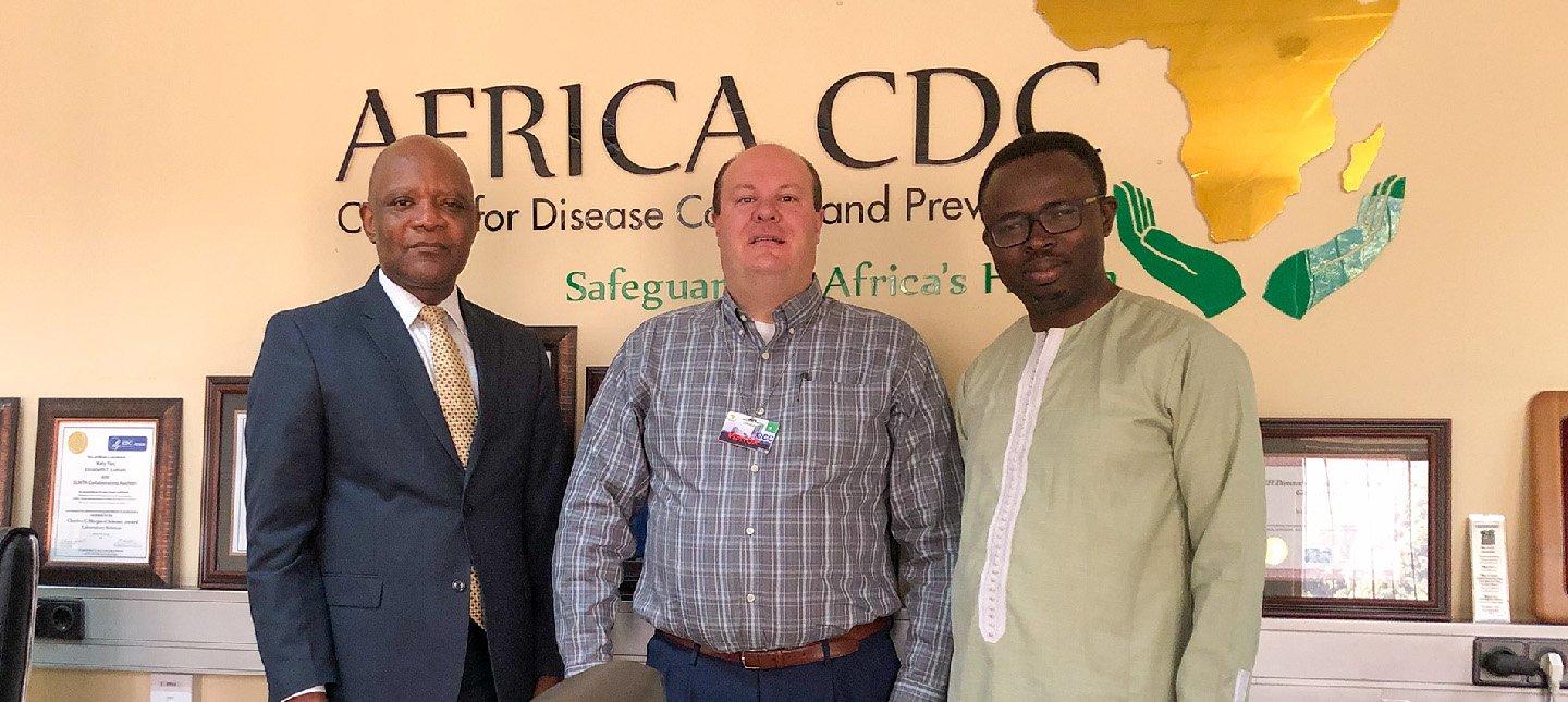 Dr. Brian Dixon with officials from the Africa CDC